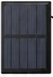 Separate solar charging panel pictured with the garage light in the client flyer